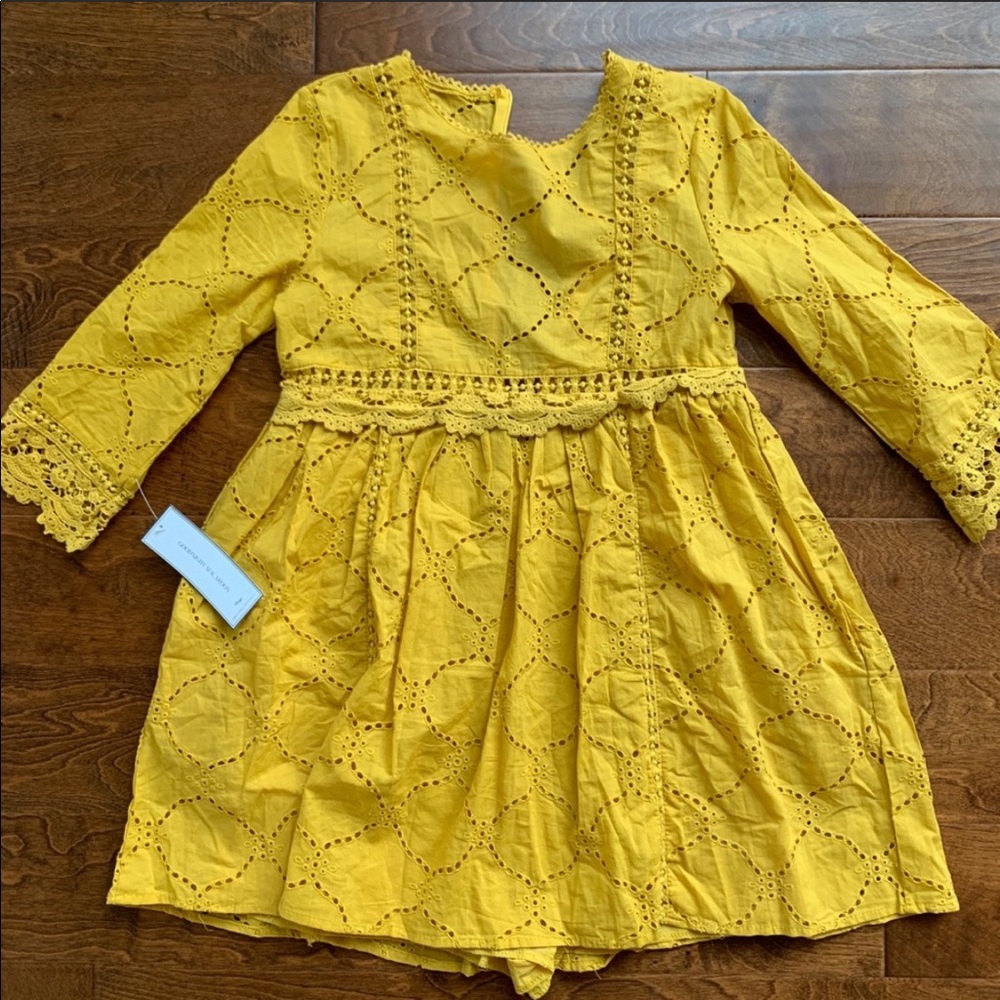 Mustard lace pleated peplum dress
